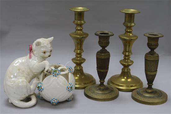 Two pairs of candlesticks and a porcelain model of a kitten with a basket candlesticks height 22cm